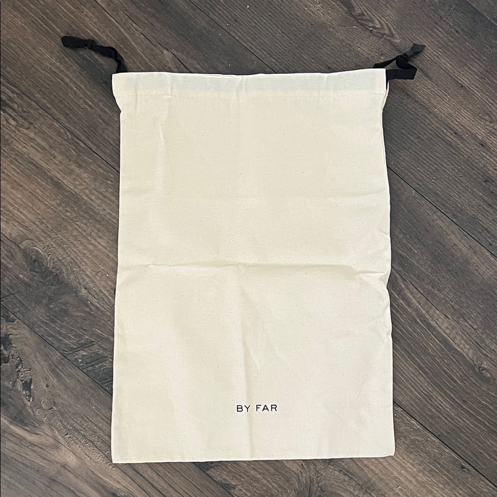 BY FAR Cream Dust Bag with Black Ties